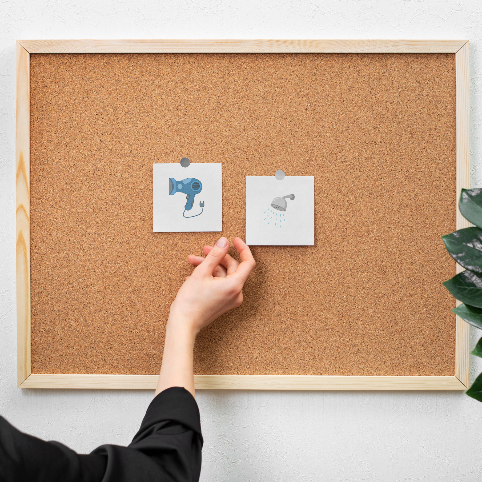 Pictogrammes seche cheveux et douche sur tableau en liege